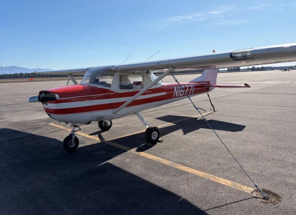 Red white training airplane